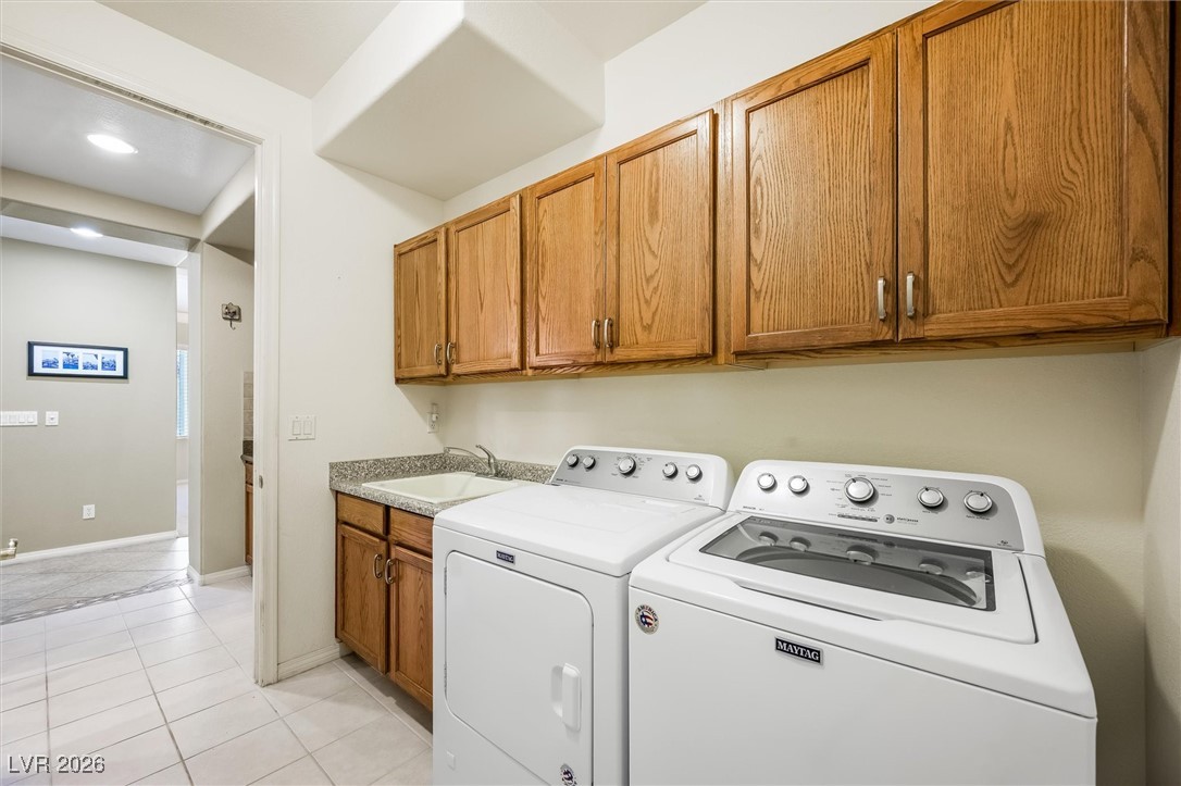 7517 Midnight Rambler Street Las Vegas, NV 89149 - Photo 31 of 68 Separate laundry area with sink and MORE cabinets