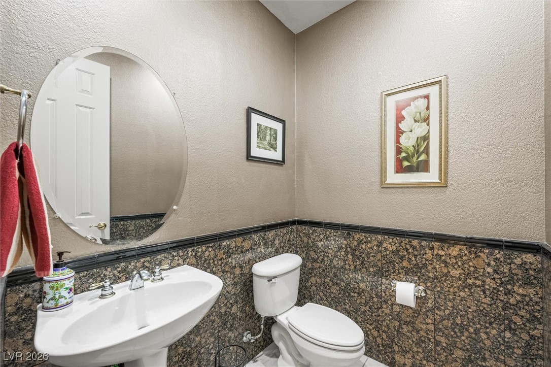 7517 Midnight Rambler Street Las Vegas, NV 89149 - Photo 32 of 68 1/2 bath downstairs