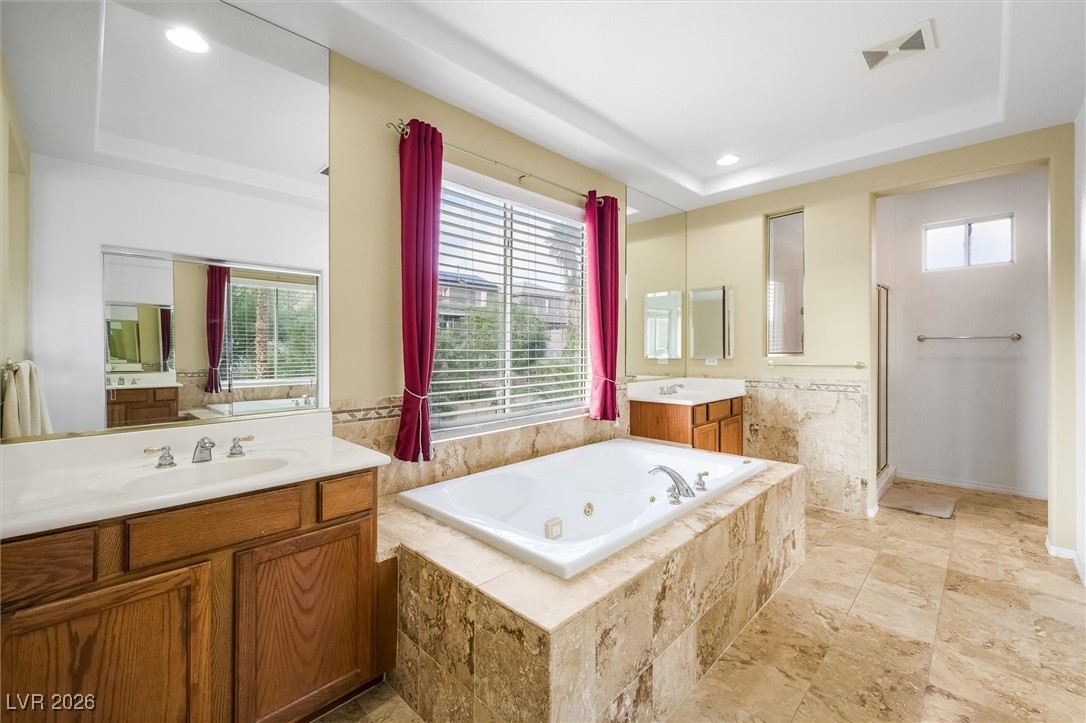 7517 Midnight Rambler Street Las Vegas, NV 89149 - Photo 46 of 68 2 separate sinks/vanities with great big bathtub, private shower area
