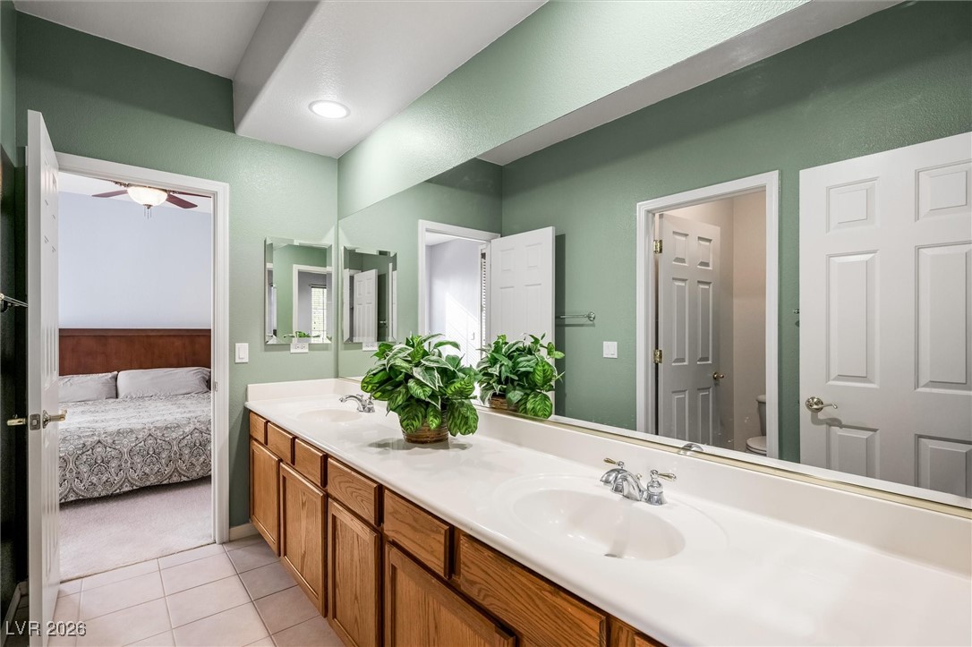 7517 Midnight Rambler Street Las Vegas, NV 89149 - Photo 53 of 68 Jack and Jill bathroom with double sink vanity facing bedroom 1
