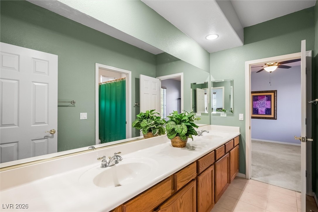 7517 Midnight Rambler Street Las Vegas, NV 89149 - Photo 54 of 68 Jack and Jill bathroom with double sink vanity facing bedroom 2