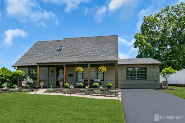 front view of a house with a yard