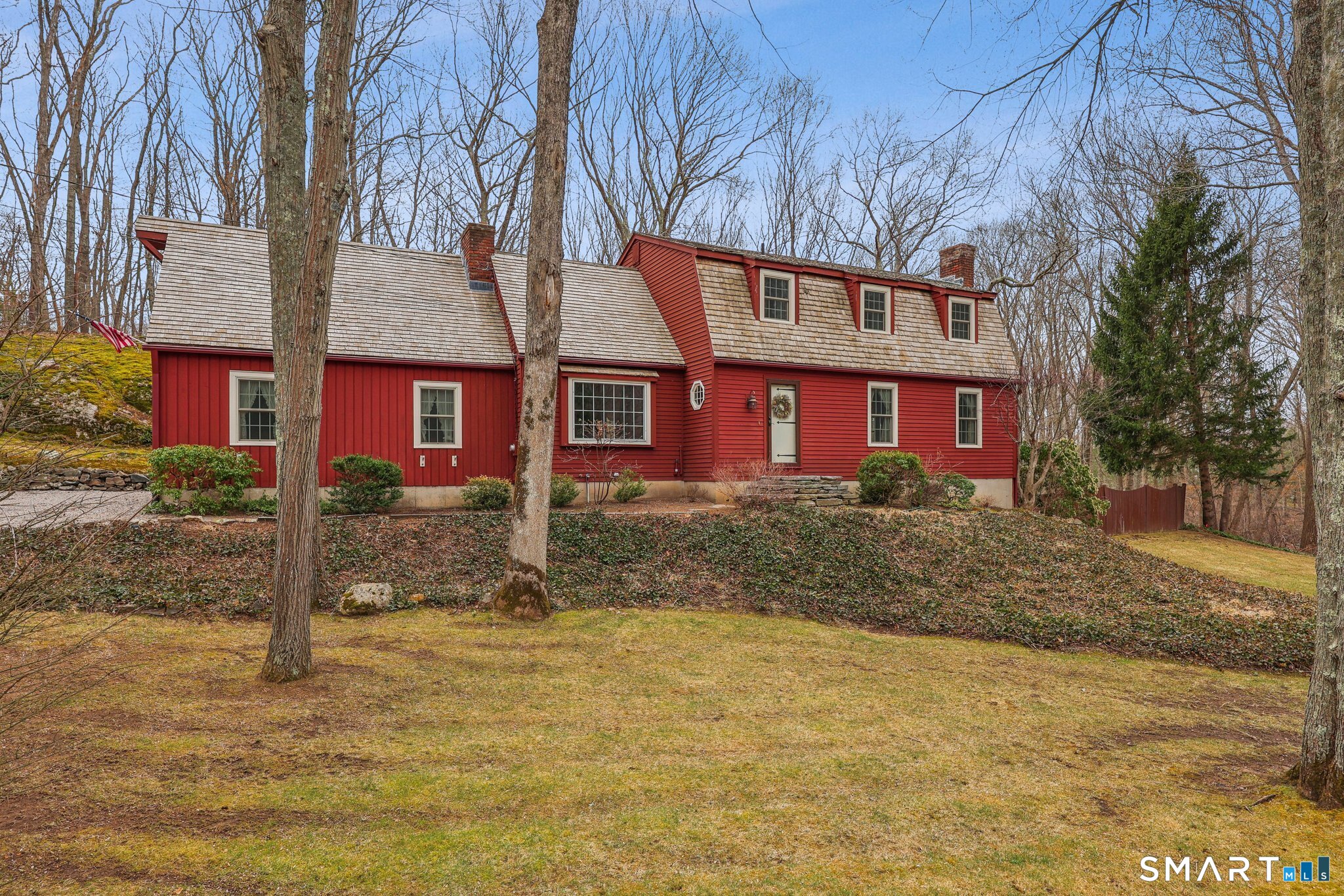 30 Church Lane Madison, CT 06443 - Photo 1 of 1 a front view of a house with a yard
