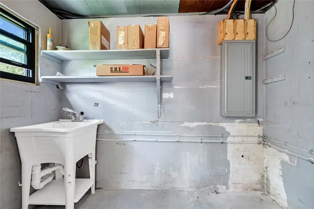 a utility room with washer and dryer