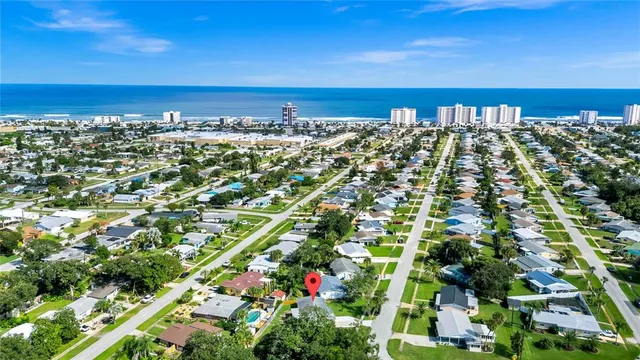 a view of a city with an ocean