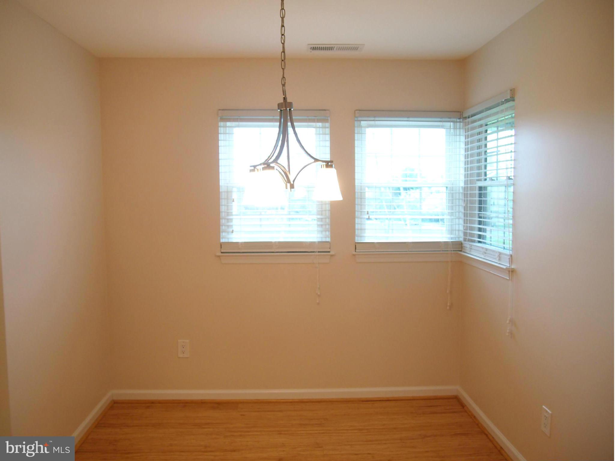 8341 Montgomery Run Road, Unit G Ellicott City, MD 21043 - Photo 14 of 30 Dining Room