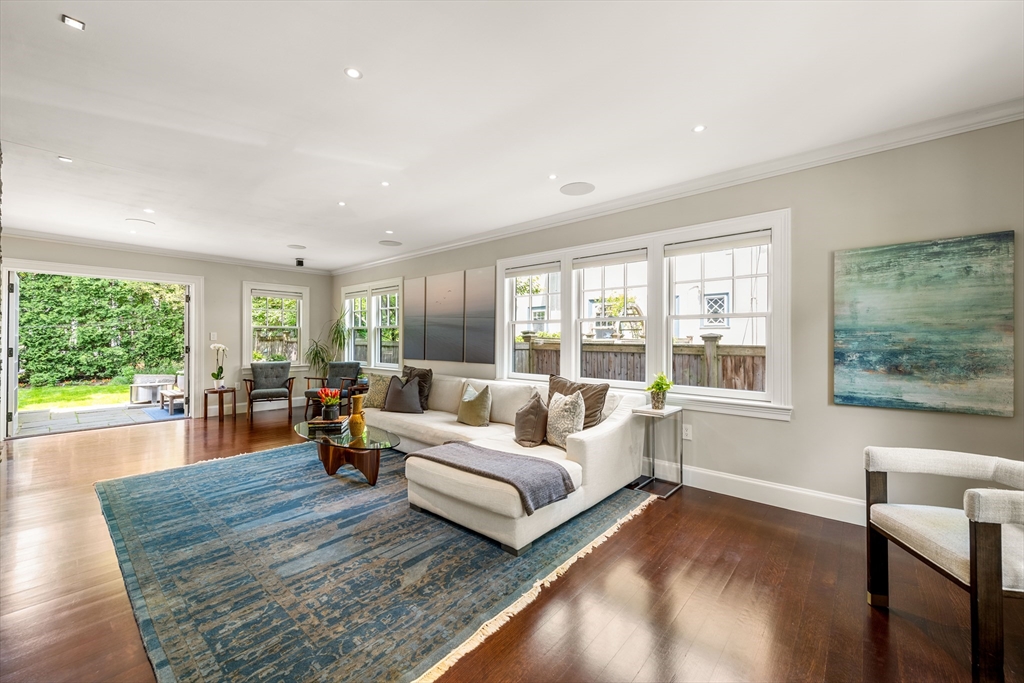 53 Crowninshield Road Brookline, MA 02446 - Photo 16 of 42 a living room with furniture and a large window