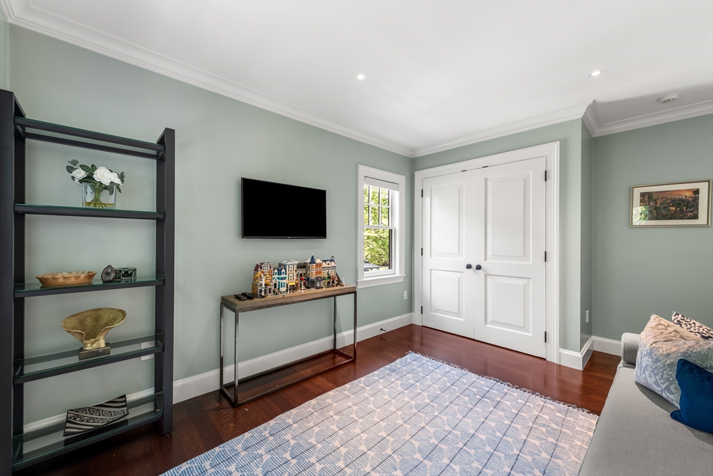 53 Crowninshield Road Brookline, MA 02446 - Photo 22 of 42 a bedroom with furniture and window