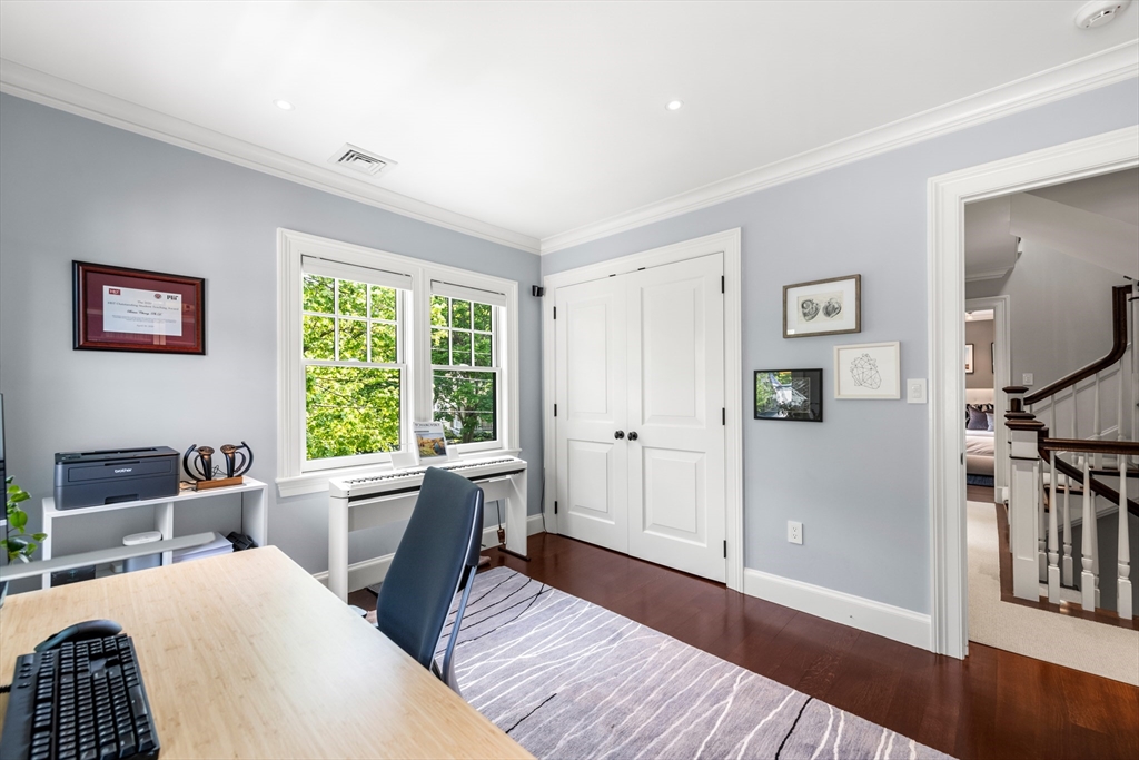 53 Crowninshield Road Brookline, MA 02446 - Photo 24 of 42 a view of a livingroom with furniture and a window