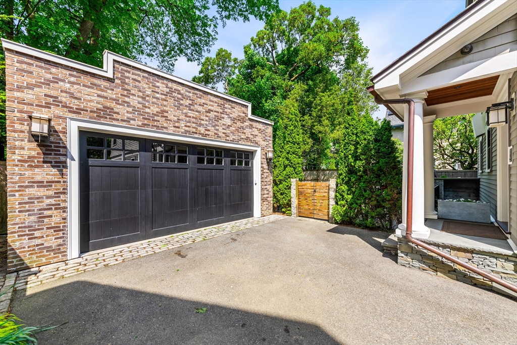 53 Crowninshield Road Brookline, MA 02446 - Photo 4 of 42 a view of a house with a yard