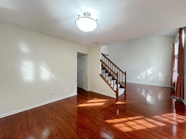 a view of entryway with wooden floor