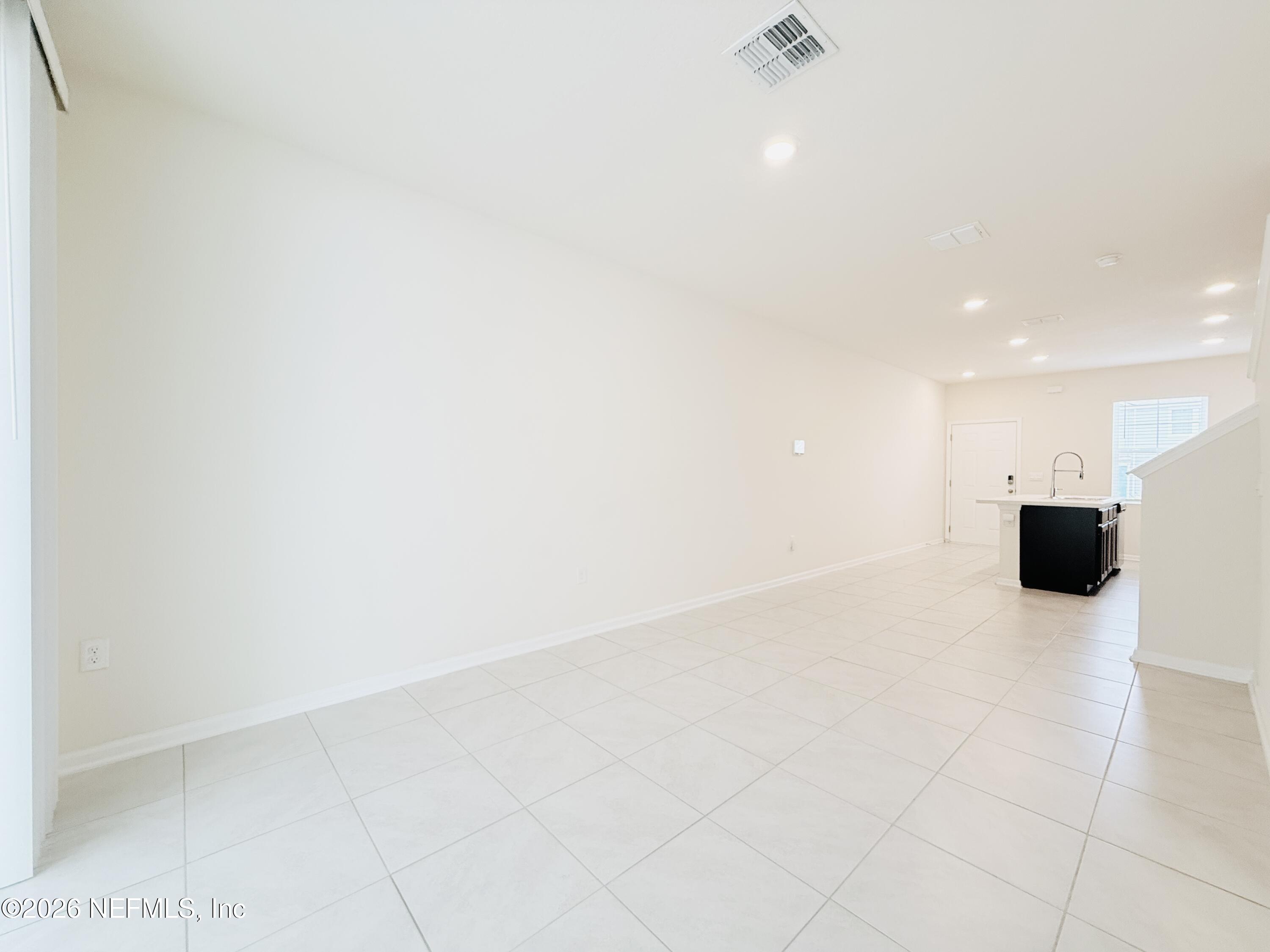 847 Gate Run Road Jacksonville, FL 32211 - Photo 7 of 19 a view of empty room with wooden floor