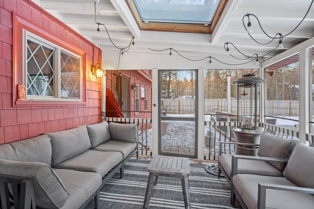 6 Oxford Road Hampstead, NH 03841 - Photo 26 of 32 a living room with furniture a ceiling fan and a window