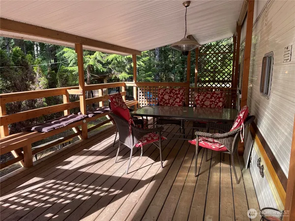 a view of a outdoor sitting area with furniture