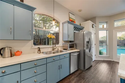 a bedroom with a bed furniture and a window