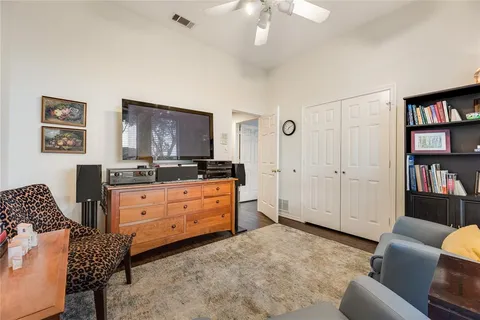 a bedroom with a bed furniture and a window