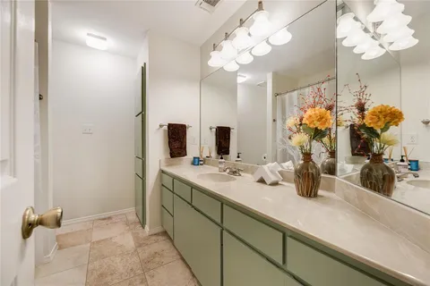 a view of swimming pool with seating space