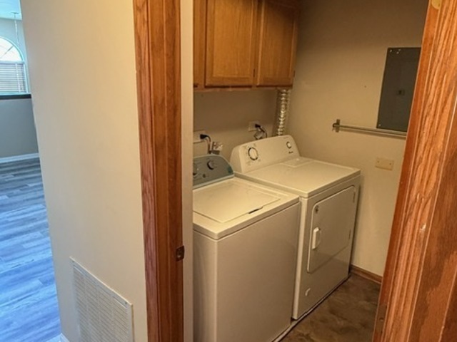 16 Tyler Court, Unit B Streamwood, IL 60107 - Photo 18 of 20 a utility room with dryer and washer