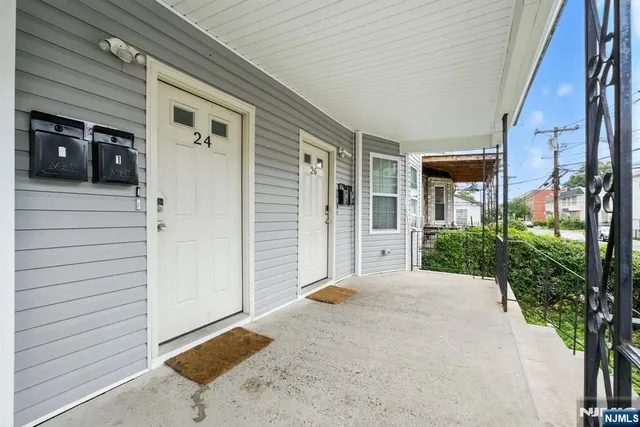 a view of a house with a patio