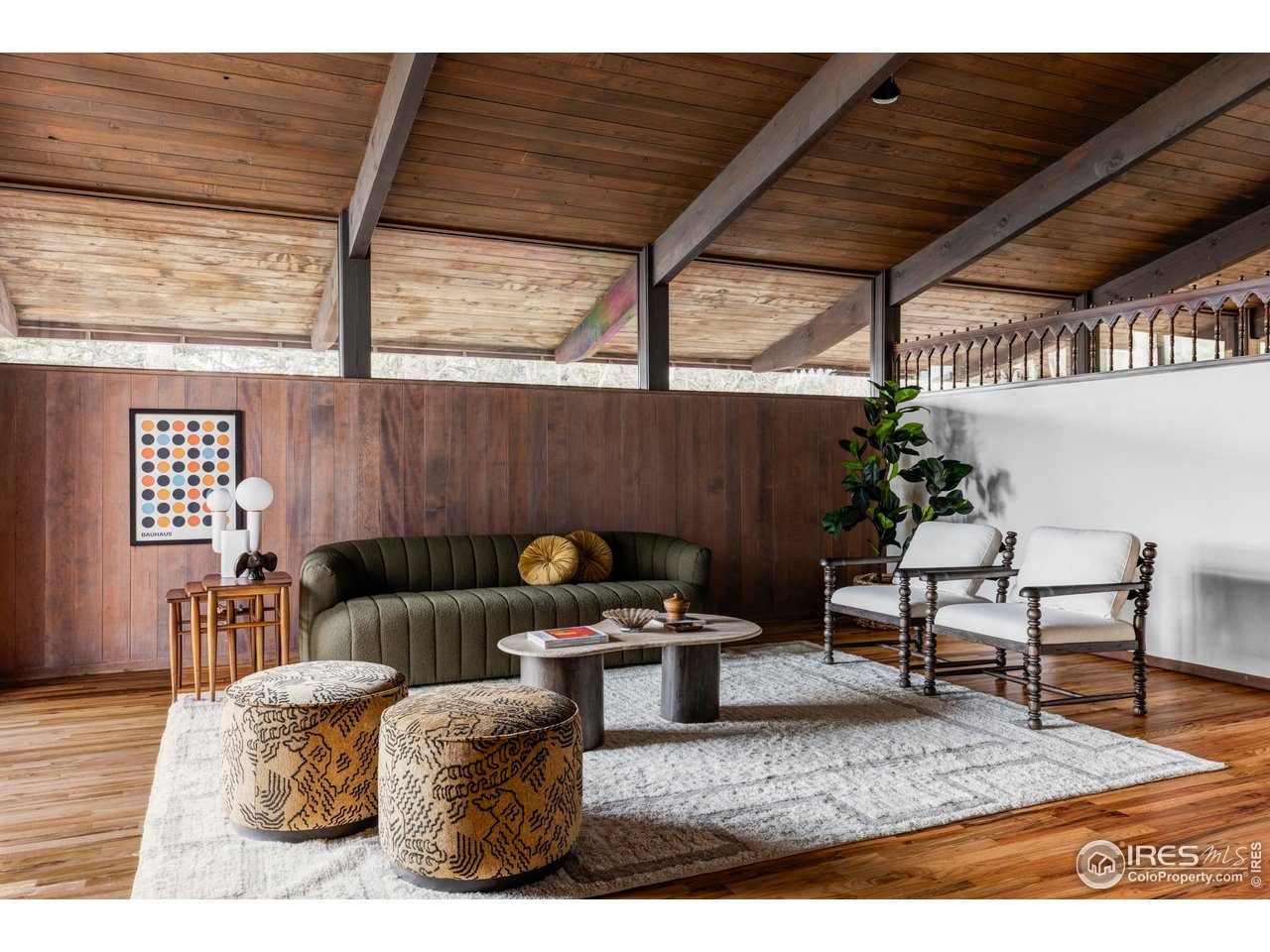 705 Willowbrook Road Boulder, CO 80302 - Photo 18 of 34 a living room with furniture and a table