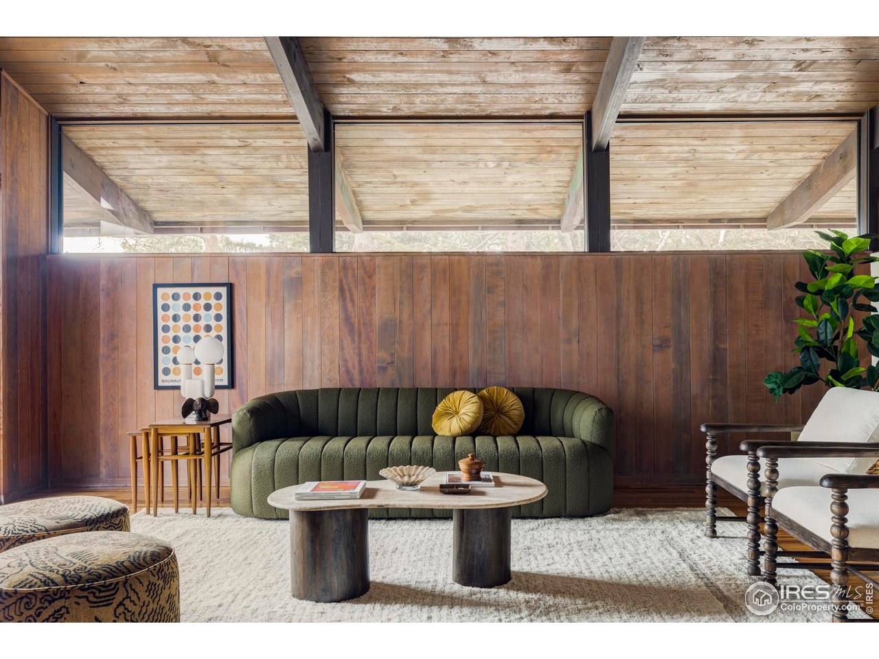 705 Willowbrook Road Boulder, CO 80302 - Photo 19 of 34 a living room with furniture and a large window