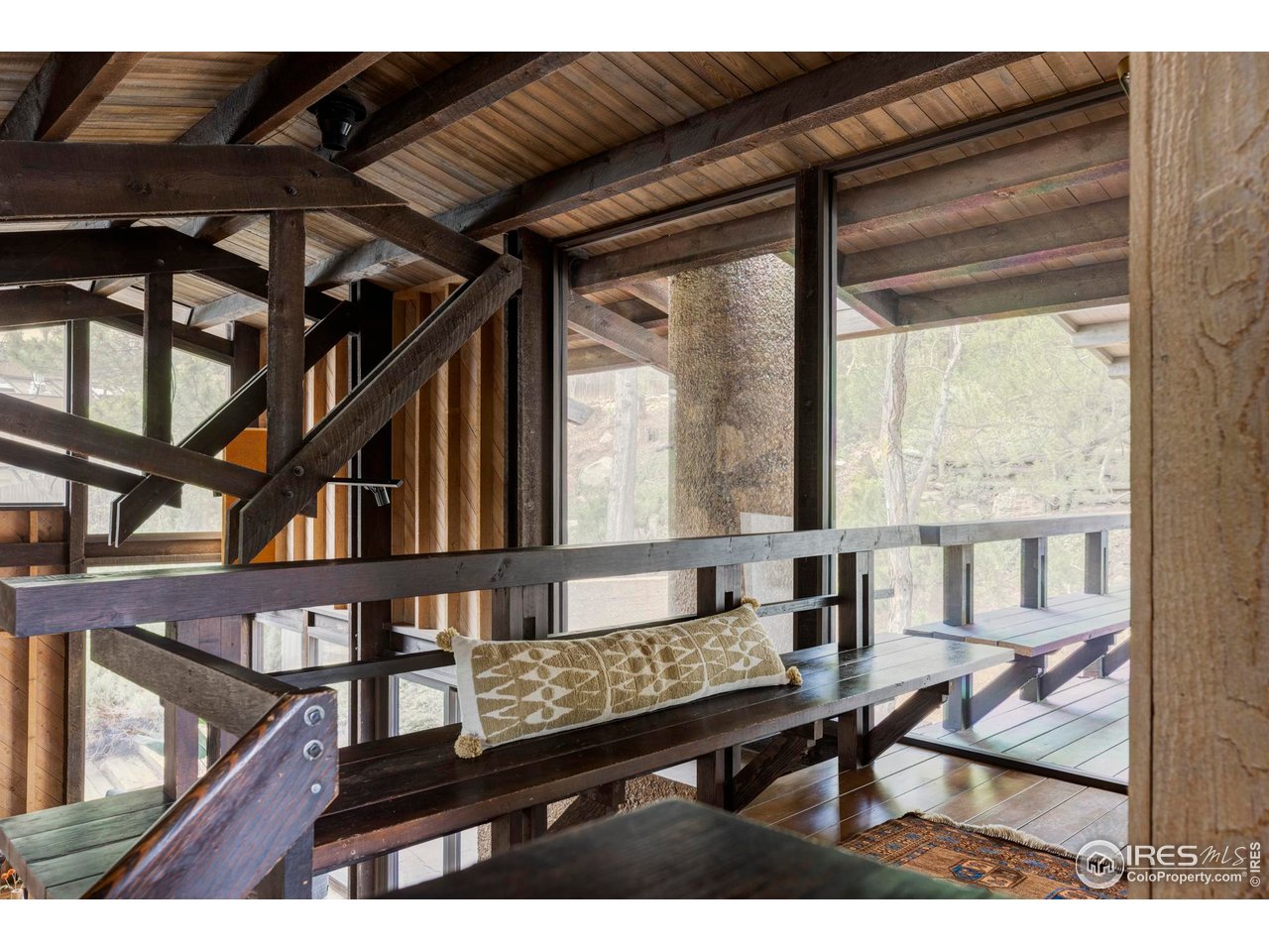 705 Willowbrook Road Boulder, CO 80302 - Photo 22 of 34 a living room with a furniture