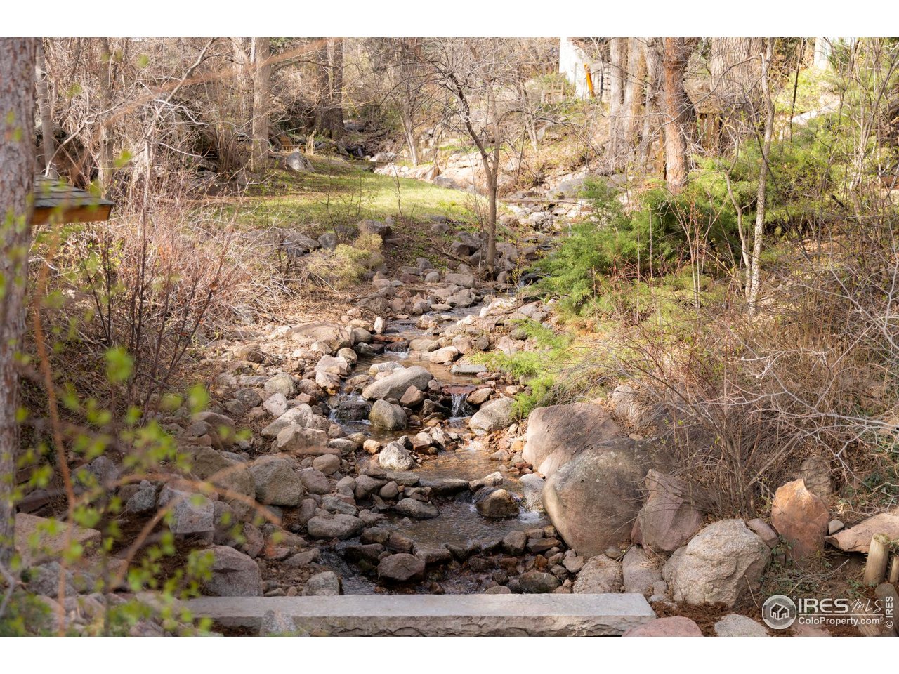 705 Willowbrook Road Boulder, CO 80302 - Photo 31 of 34 a view of a yard with lake view
