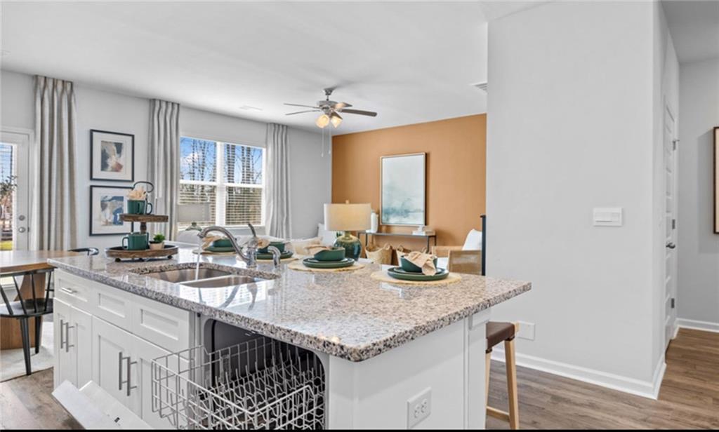 205 Storm Lane Hoschton, GA 30548 - Photo 14 of 51 a bathroom with sinks granite countertop a sink and a mirror