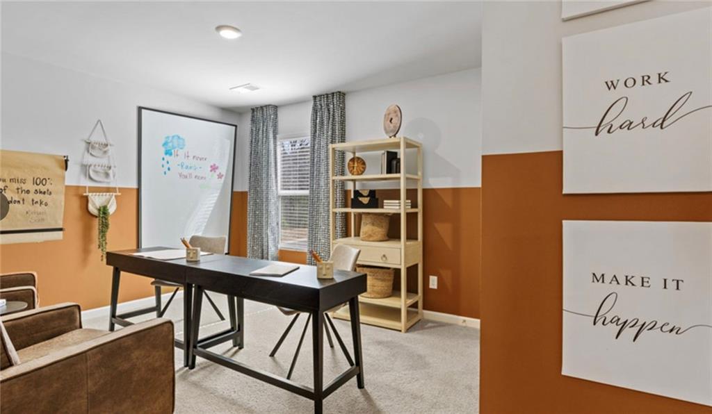 205 Storm Lane Hoschton, GA 30548 - Photo 45 of 51 a view of a workspace with furniture