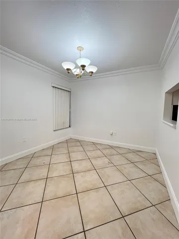a stove top oven sitting inside of a kitchen