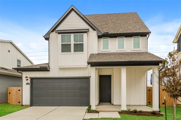a house view with a garden space