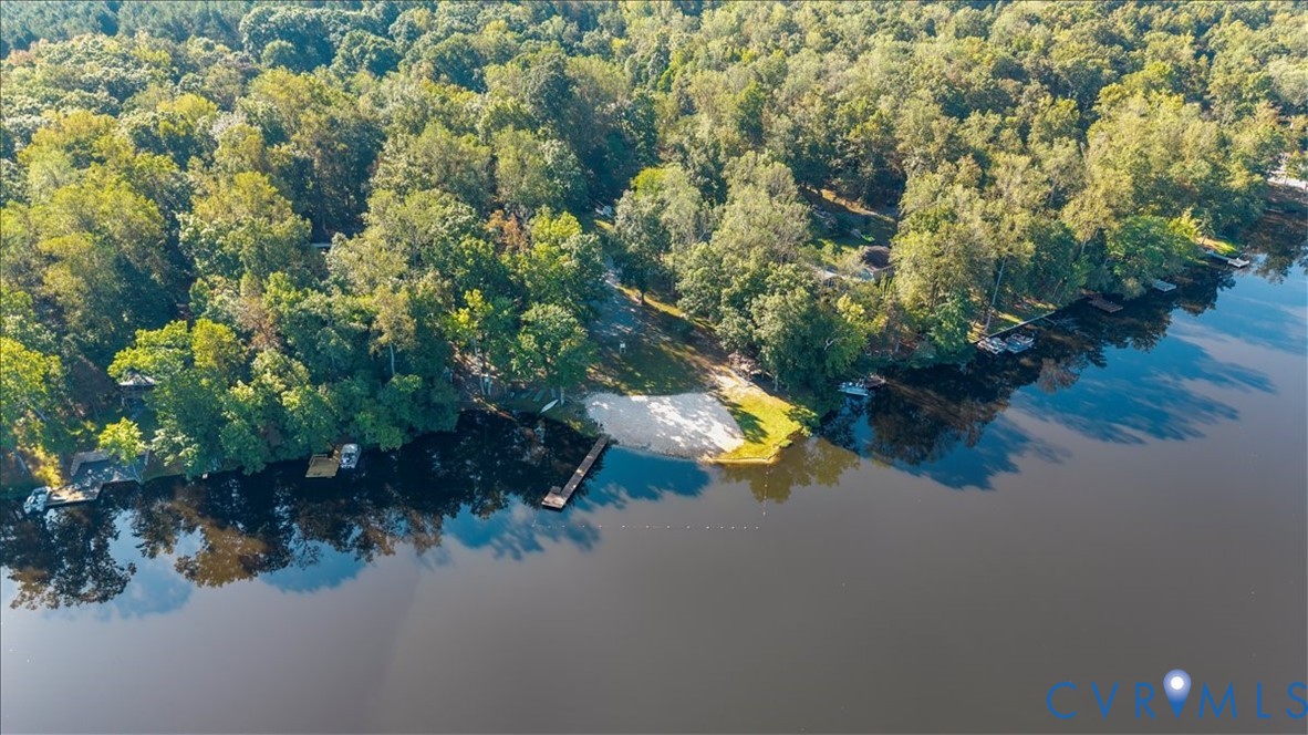 7 Trices Lake Road Columbia, VA 23038 - Photo 20 of 44 an aerial view of a house with a yard and lake view