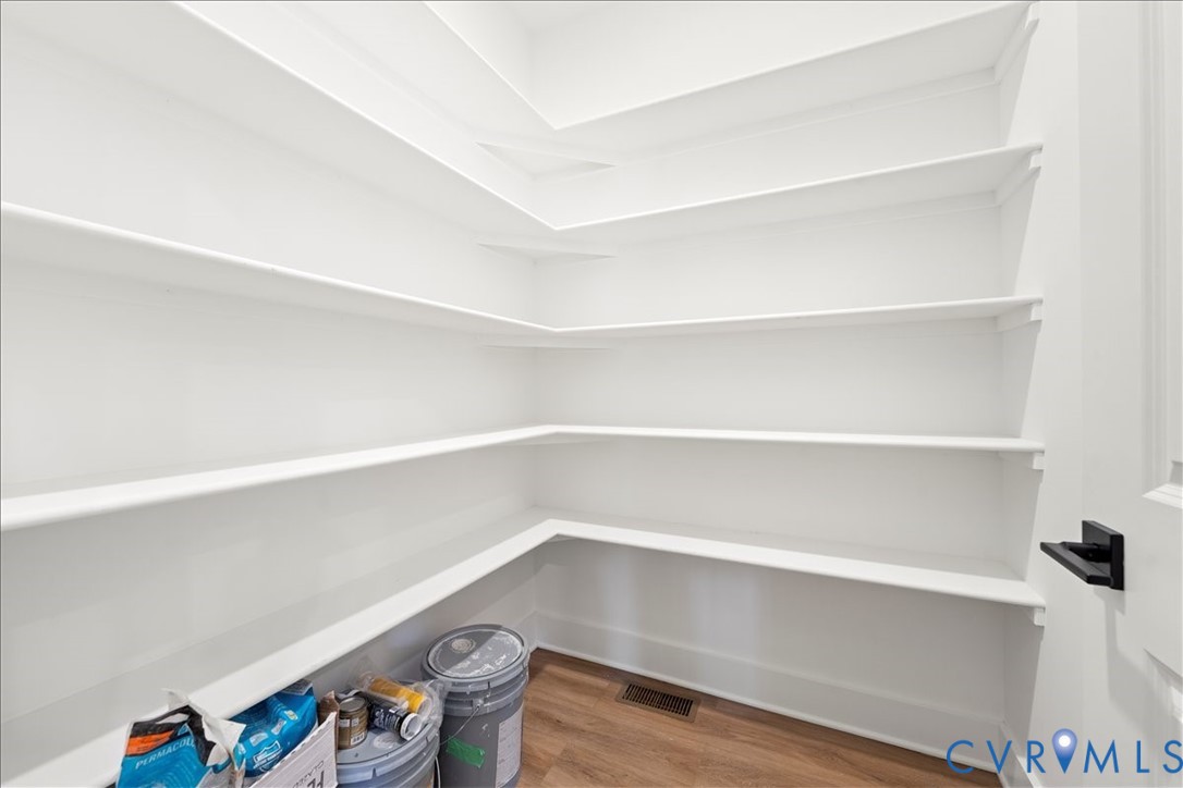 7 Trices Lake Road Columbia, VA 23038 - Photo 34 of 44 a view of storage and utility room with empty racks