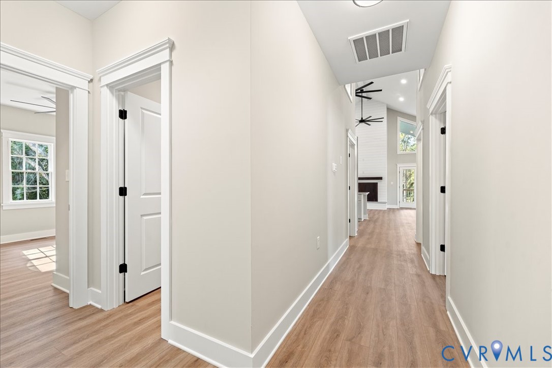 7 Trices Lake Road Columbia, VA 23038 - Photo 44 of 44 a view of a hallway with wooden floor