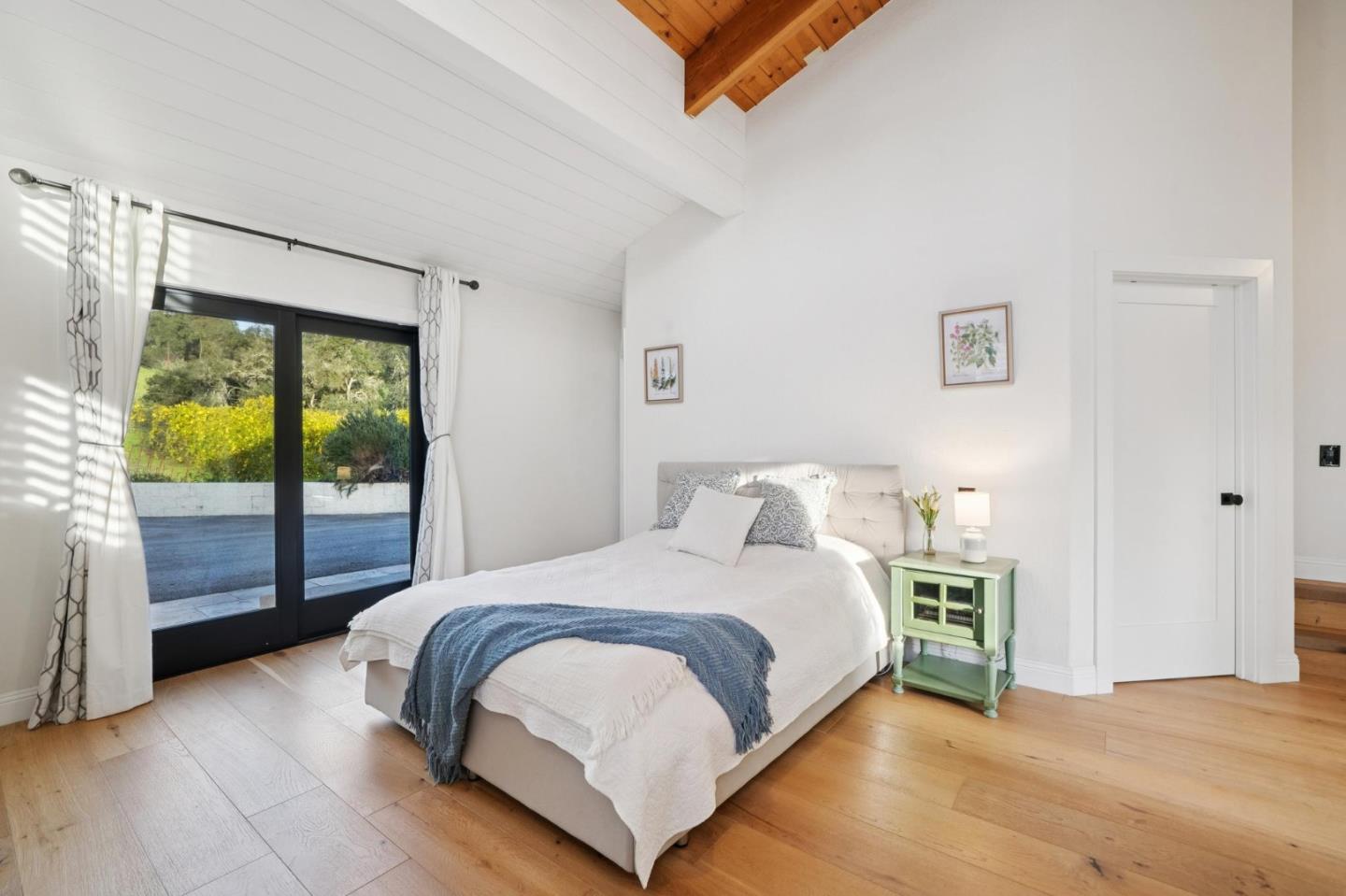 600 Ridge Top Road Los Gatos, CA 95033 - Photo 40 of 81 a bedroom with a bed and large window