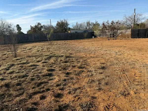 a view of outdoor space and yard