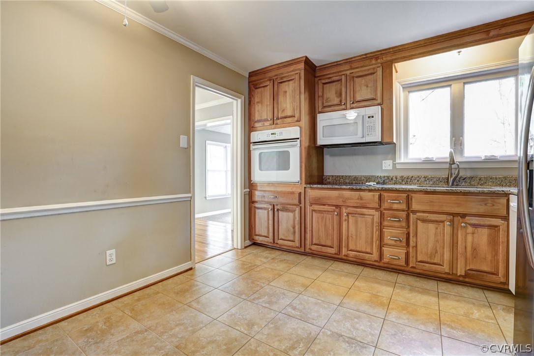 1519 Village Grove Road Henrico, VA 23238 - Photo 13 of 36 a spacious bathroom with a granite countertop sink and washing machine