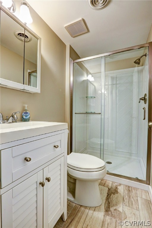 1519 Village Grove Road Henrico, VA 23238 - Photo 14 of 36 a bathroom with a shower a toilet and a sink