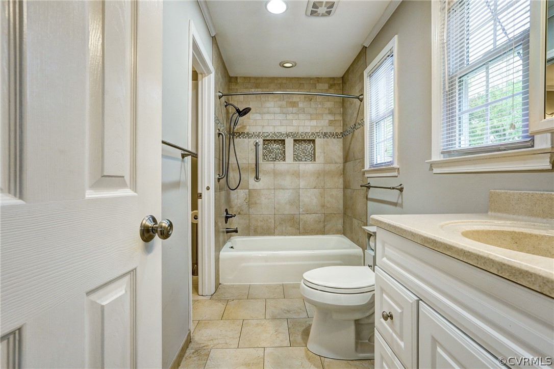 1519 Village Grove Road Henrico, VA 23238 - Photo 21 of 36 a bathroom with a granite countertop toilet a sink and a bathtub