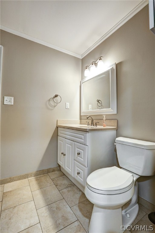 1519 Village Grove Road Henrico, VA 23238 - Photo 22 of 36 a bathroom with a toilet a sink a mirror and vanity