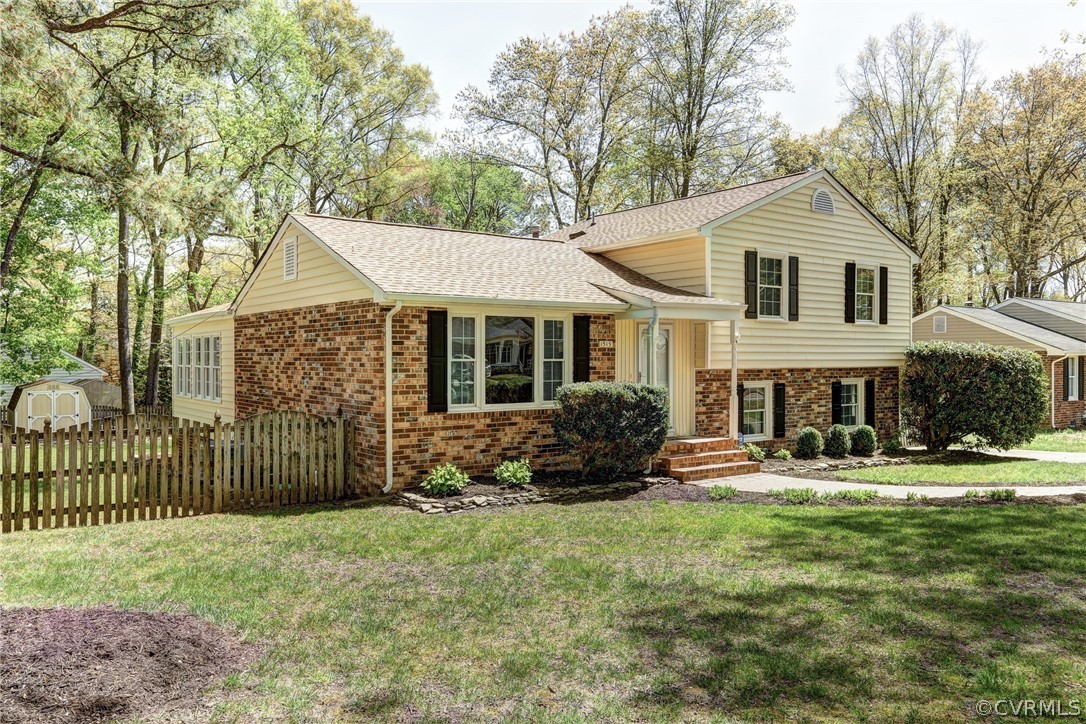 1519 Village Grove Road Henrico, VA 23238 - Photo 23 of 36 a front view of a house with a yard