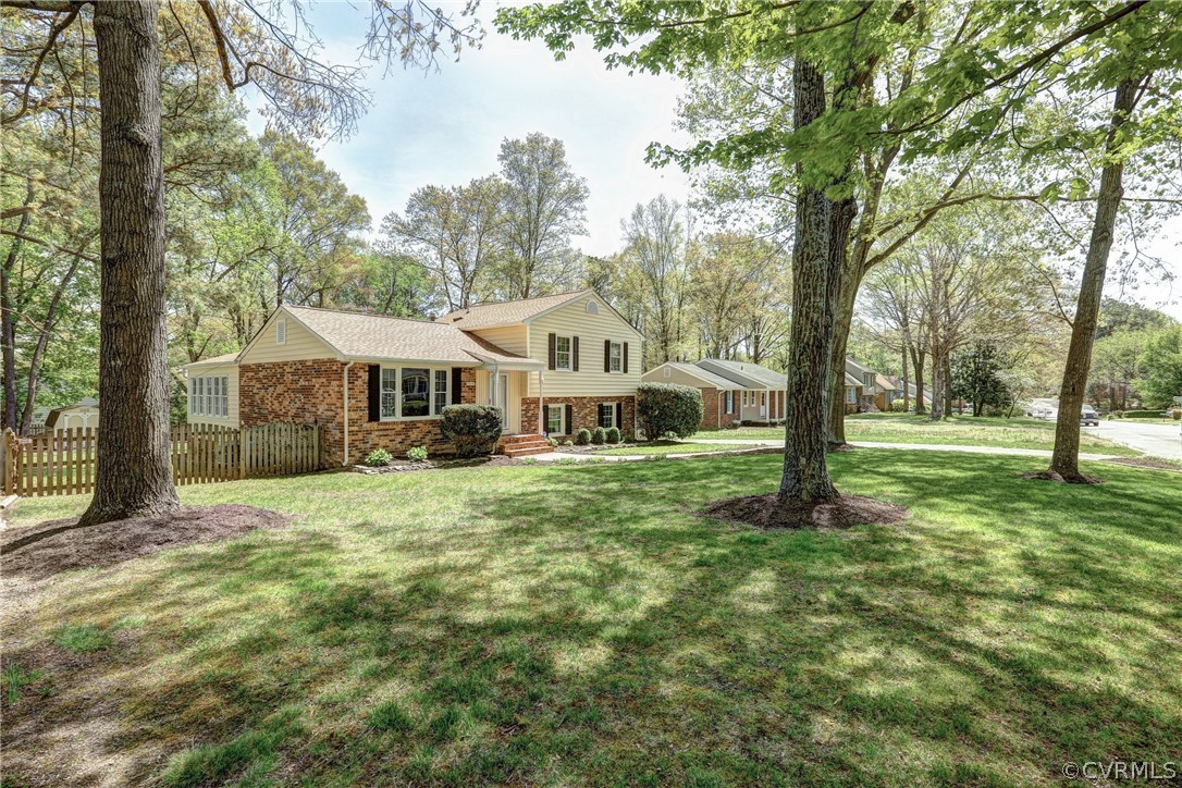 1519 Village Grove Road Henrico, VA 23238 - Photo 24 of 36 a house with trees in front of it