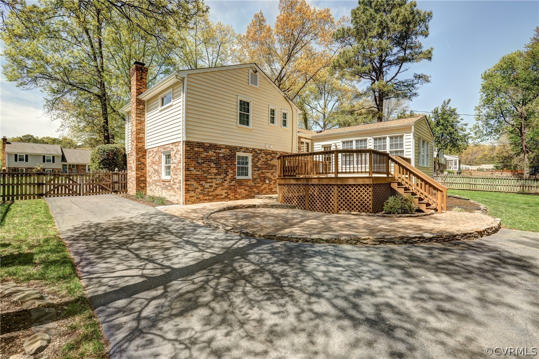 1519 Village Grove Road Henrico, VA 23238 - Photo 29 of 36 a view of a house with a yard covered in snow