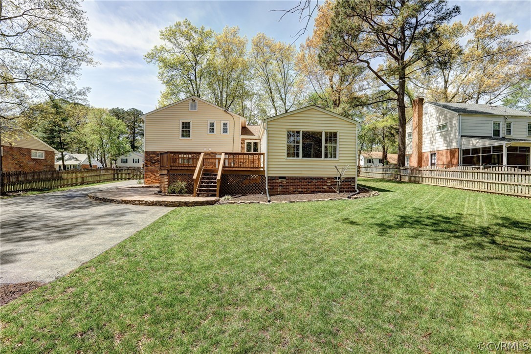 1519 Village Grove Road Henrico, VA 23238 - Photo 33 of 36 a front view of a house with a yard and trees