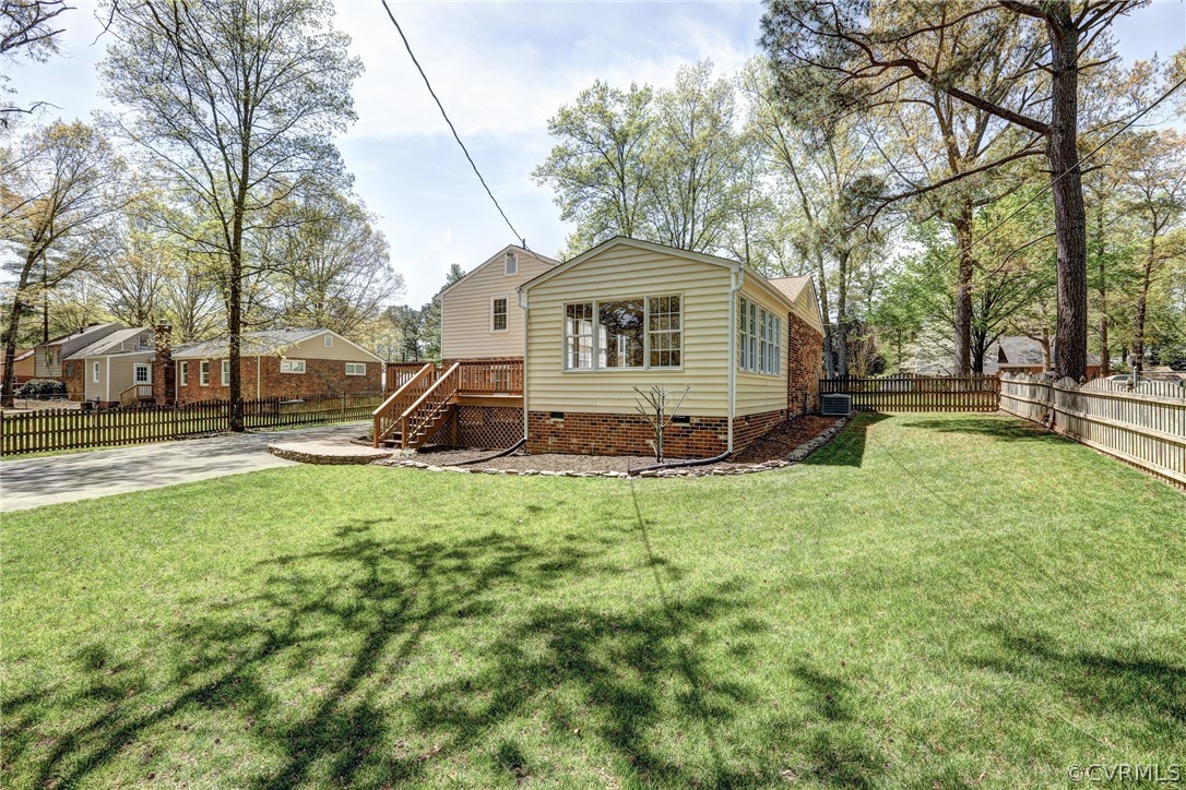 1519 Village Grove Road Henrico, VA 23238 - Photo 34 of 36 a front view of a house with a yard
