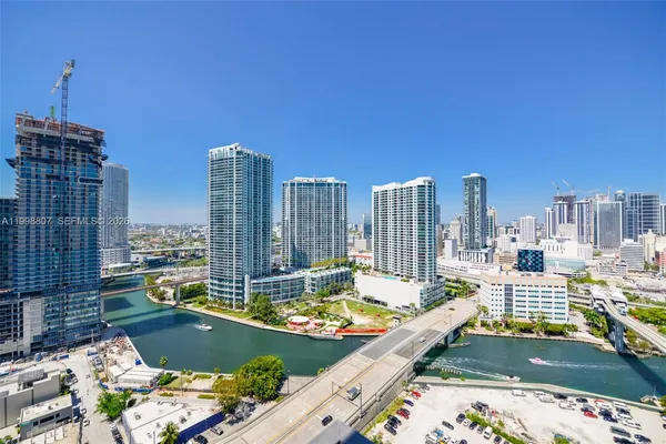 a view of swimming pool with outdoor seating