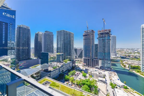 a view of a city with tall buildings