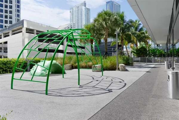 a view of yard along with palm trees