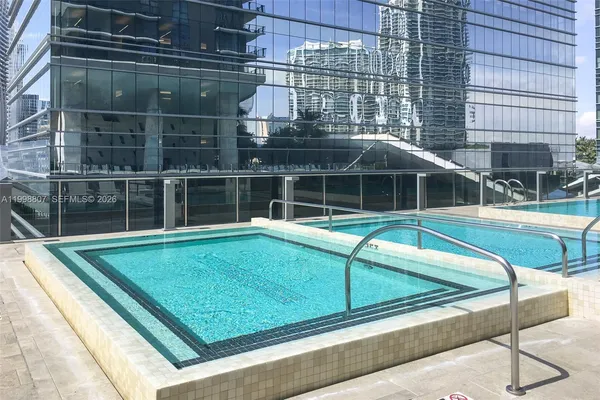 a view of a house with a swimming pool
