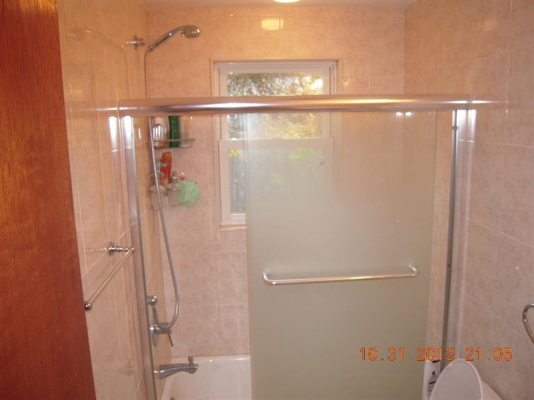49 Lower County Road, Unit 16 Dennis Port, MA 02639 - Photo 5 of 12 a bathroom with a shower